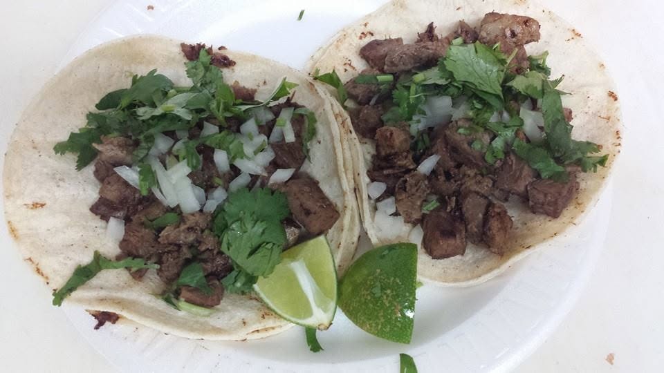 Tacos de bistec from El Placerito — cilantro, onion, lime on corn tortillas
