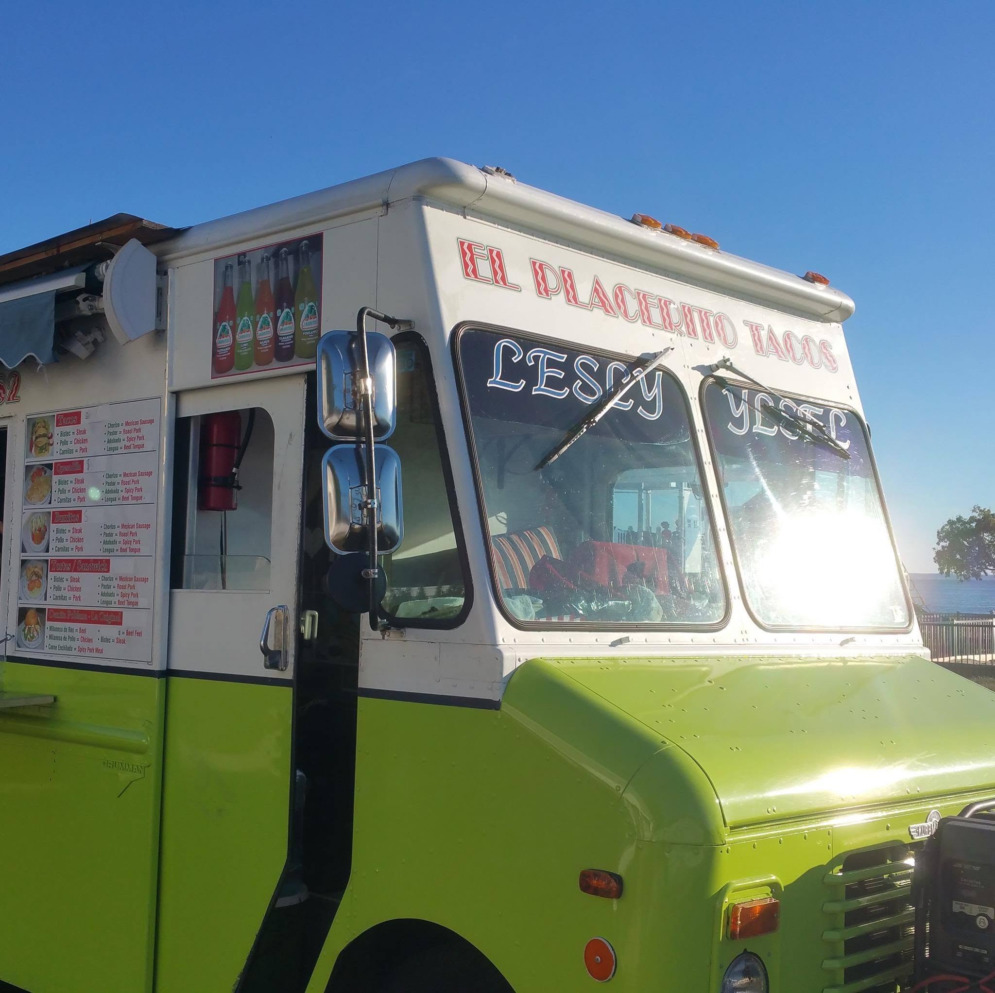 El Placerito Tacos truck — the lime-green cab with the name clearly visible, parked in sunlight